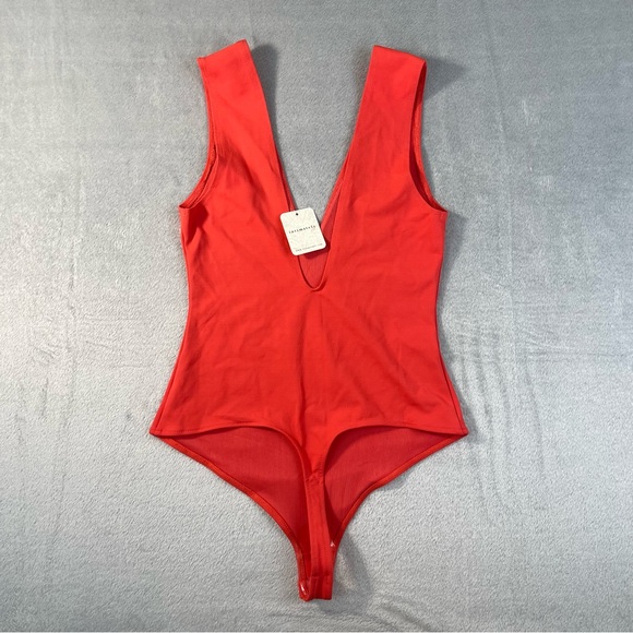 Free People Keep It Sleek Bodysuit NWT XS Pink Poinsettia One-Piece Chic - Picture 1 of 8